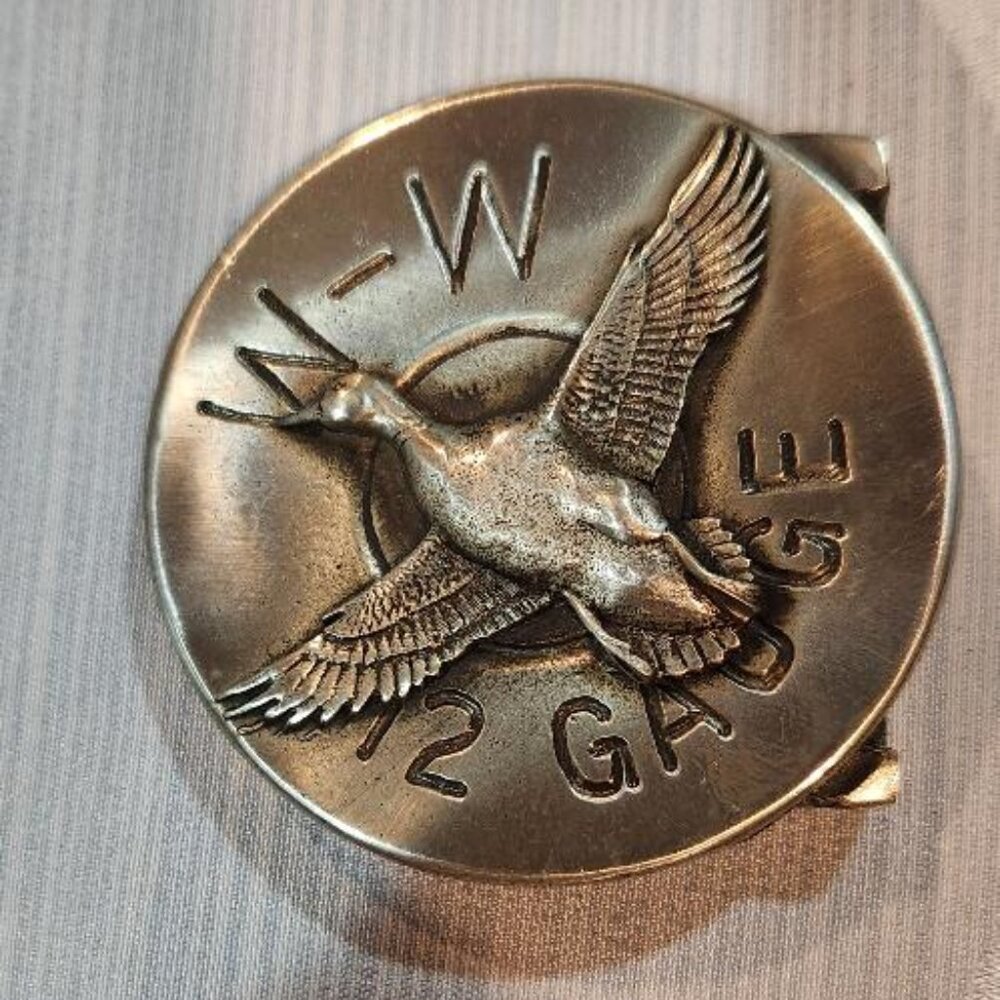 Vintage Pewter flying duck 12 gauge Belt buckle by Sid Bell